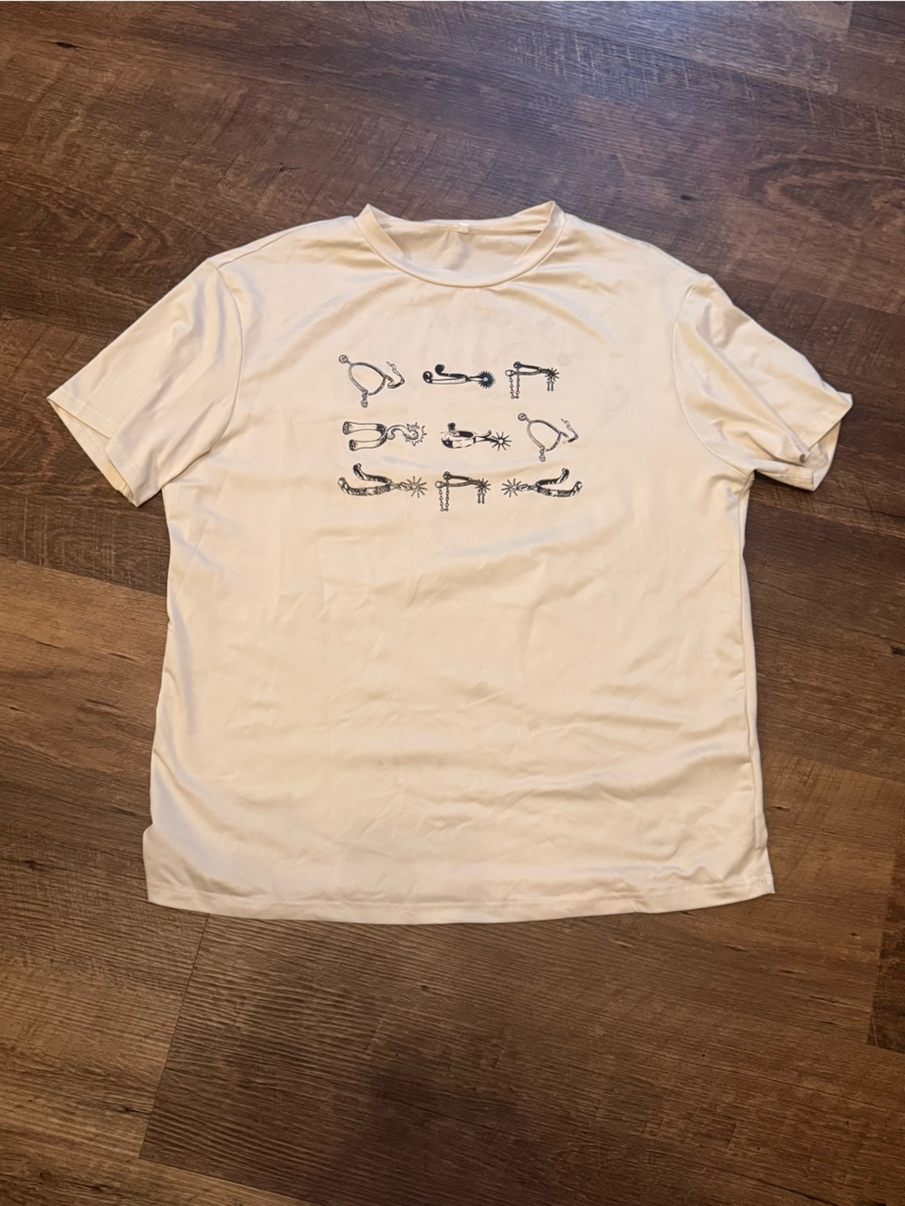 Graphic Cream Short Sleeve Tee with Black Spur Symbol Print